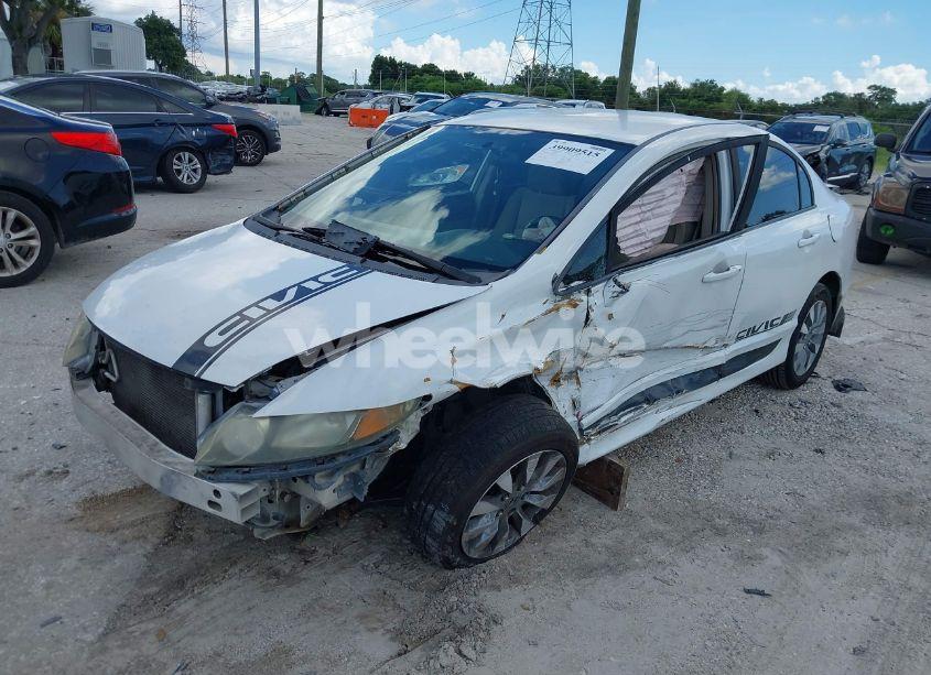 Photo 2 of 2011 Honda Civic LX (VIN 19XFA1F57BE048556)