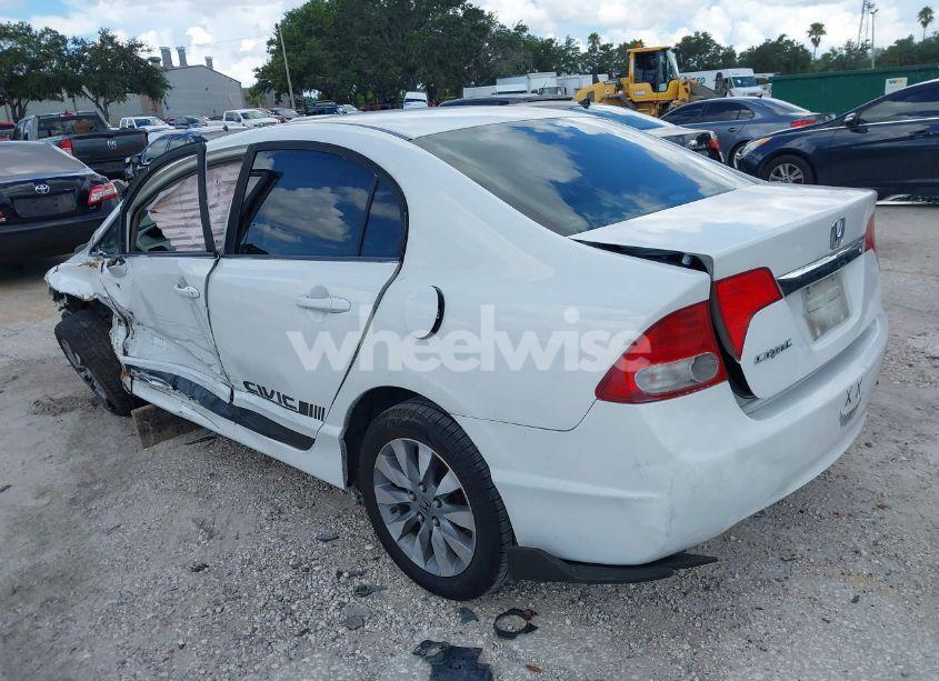 Photo 3 of 2011 Honda Civic LX (VIN 19XFA1F57BE048556)