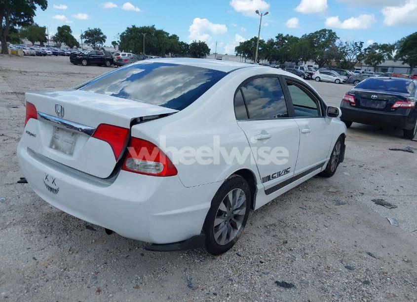 Photo 4 of 2011 Honda Civic LX (VIN 19XFA1F57BE048556)