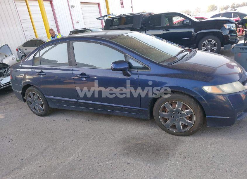 Photo 13 of 2010 Honda Civic LX (VIN 19XFA1F58AE052775)