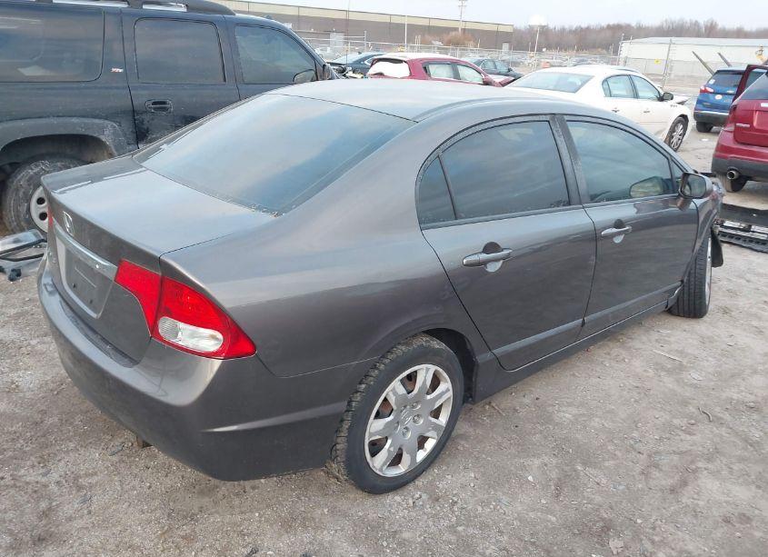 Photo 4 of 2011 Honda Civic LX (VIN 19XFA1F58BE009670)