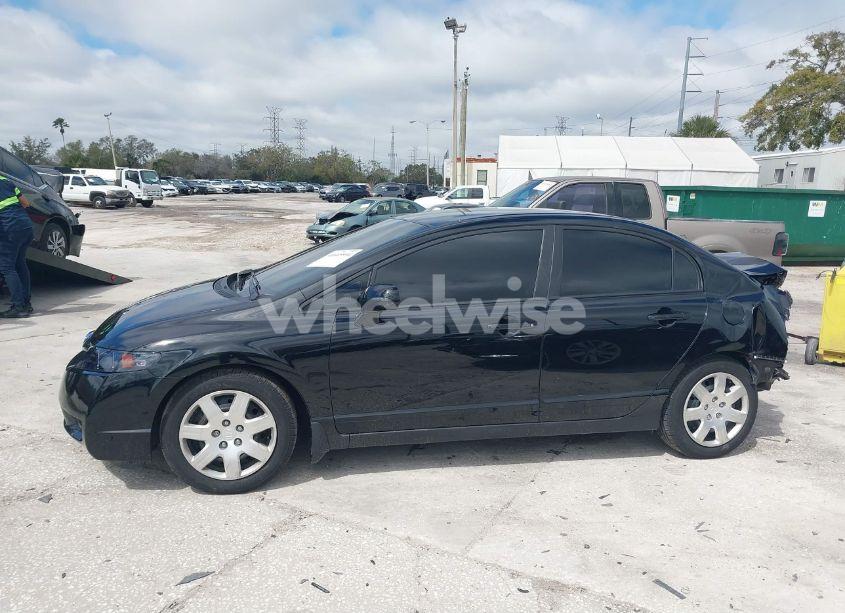 Photo 14 of 2011 Honda Civic LX (VIN 19XFA1F58BE012052)