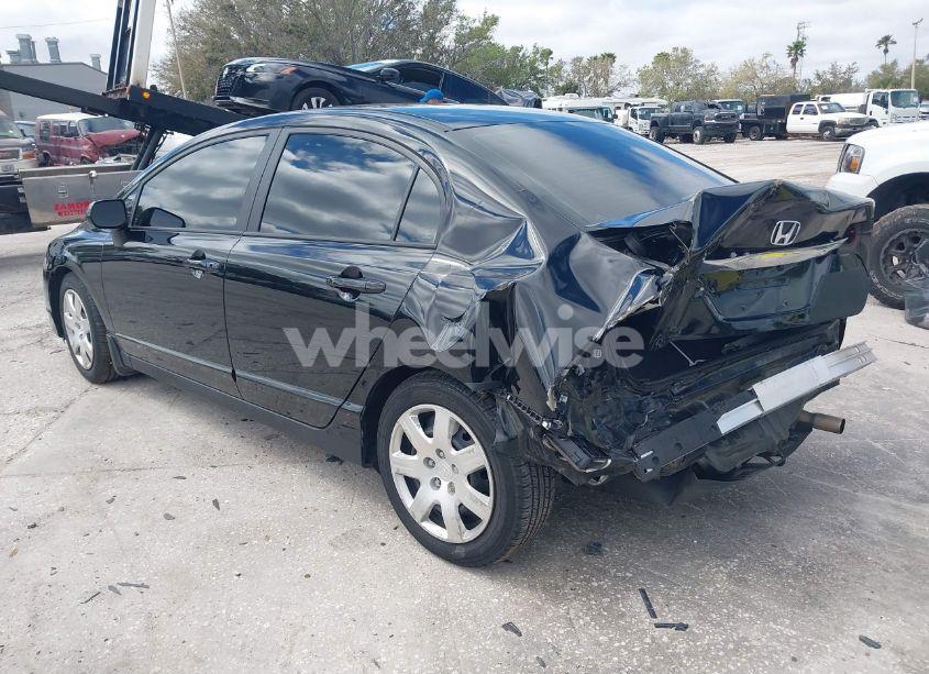 Photo 3 of 2011 Honda Civic LX (VIN 19XFA1F58BE012052)