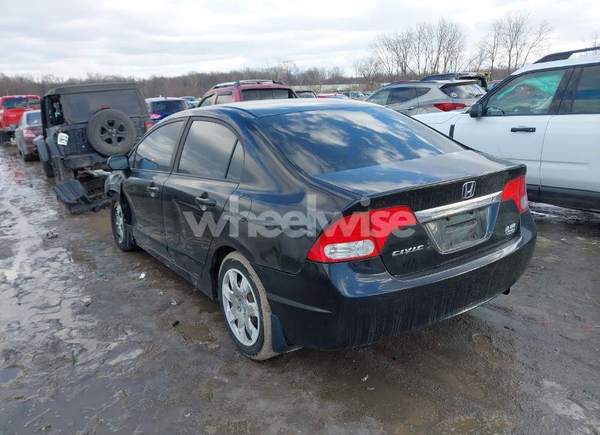 Photo 3 of 2011 Honda Civic LX (VIN 19XFA1F58BE030907)