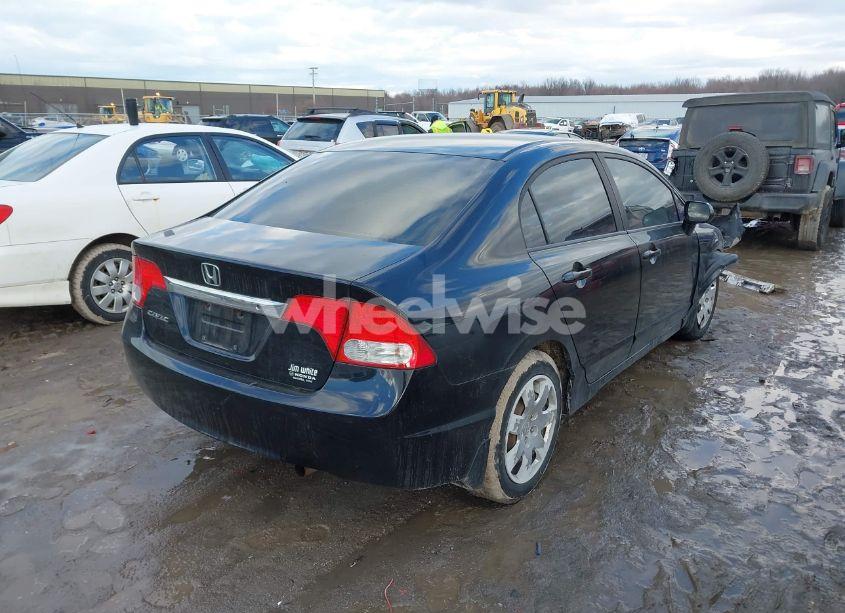 Photo 4 of 2011 Honda Civic LX (VIN 19XFA1F58BE030907)