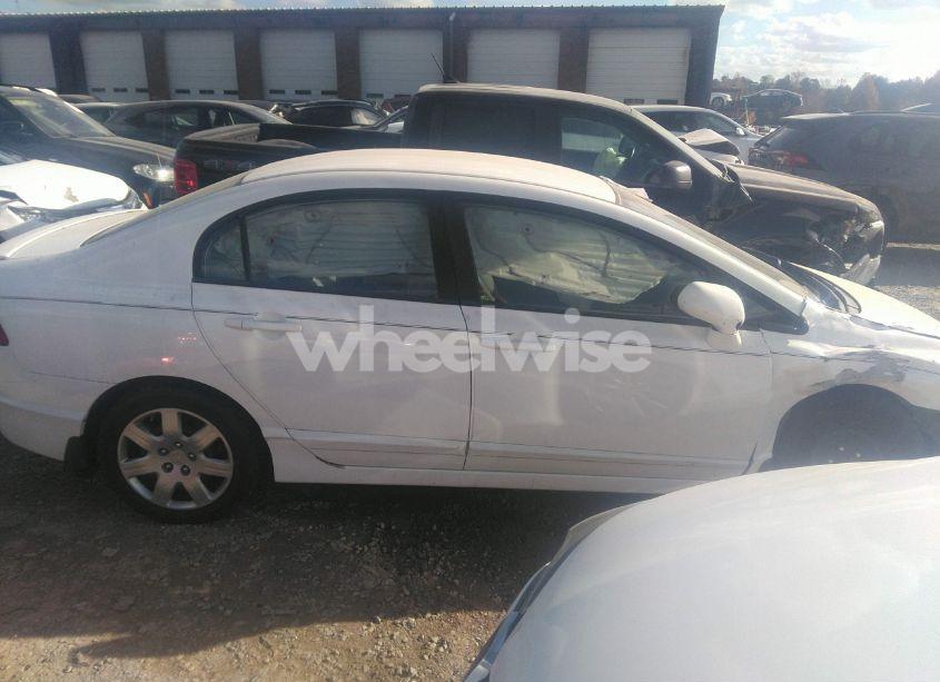Photo 14 of 2011 Honda Civic LX (VIN 19XFA1F58BE039946)
