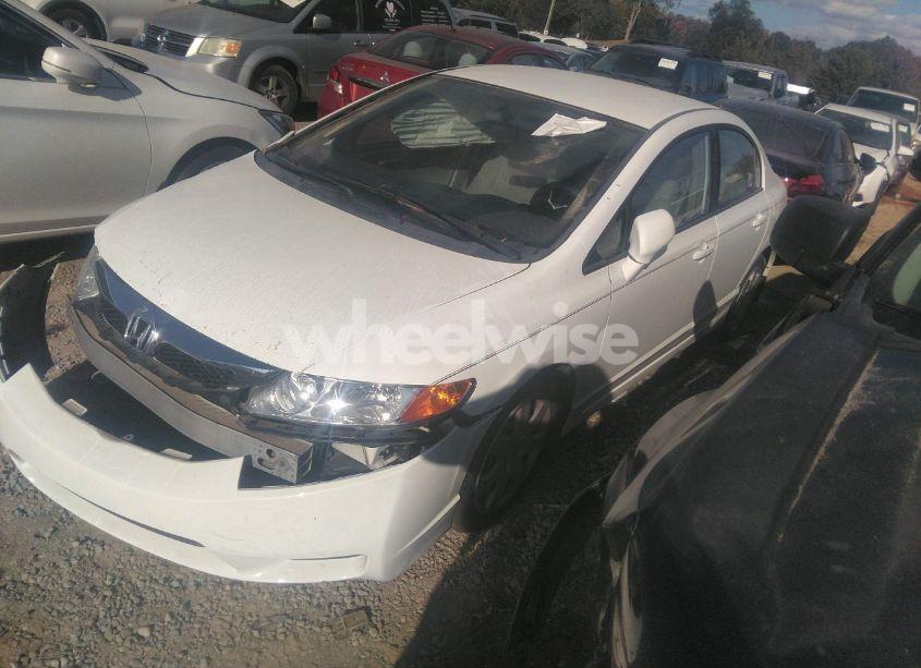 Photo 2 of 2011 Honda Civic LX (VIN 19XFA1F58BE039946)