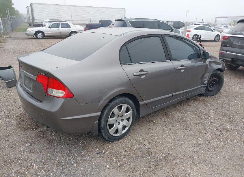 Photo 4 of 2011 Honda Civic LX (VIN 19XFA1F58BE045780)