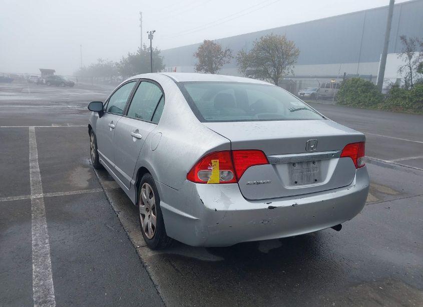 Photo 3 of 2011 Honda Civic LX (VIN 19XFA1F58BE046332)