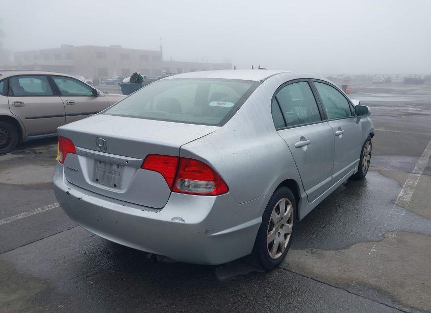 Photo 4 of 2011 Honda Civic LX (VIN 19XFA1F58BE046332)