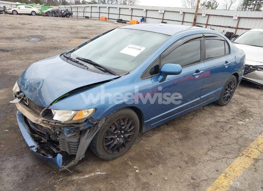 Photo 2 of 2011 Honda Civic LX (VIN 19XFA1F59BE014456)