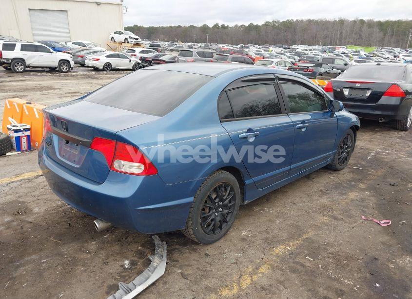 Photo 4 of 2011 Honda Civic LX (VIN 19XFA1F59BE014456)