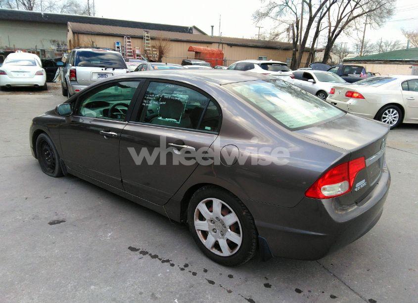 Photo 3 of 2011 Honda Civic LX (VIN 19XFA1F59BE016434)