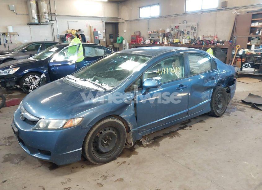 Photo 2 of 2011 Honda Civic LX (VIN 19XFA1F59BE018703)