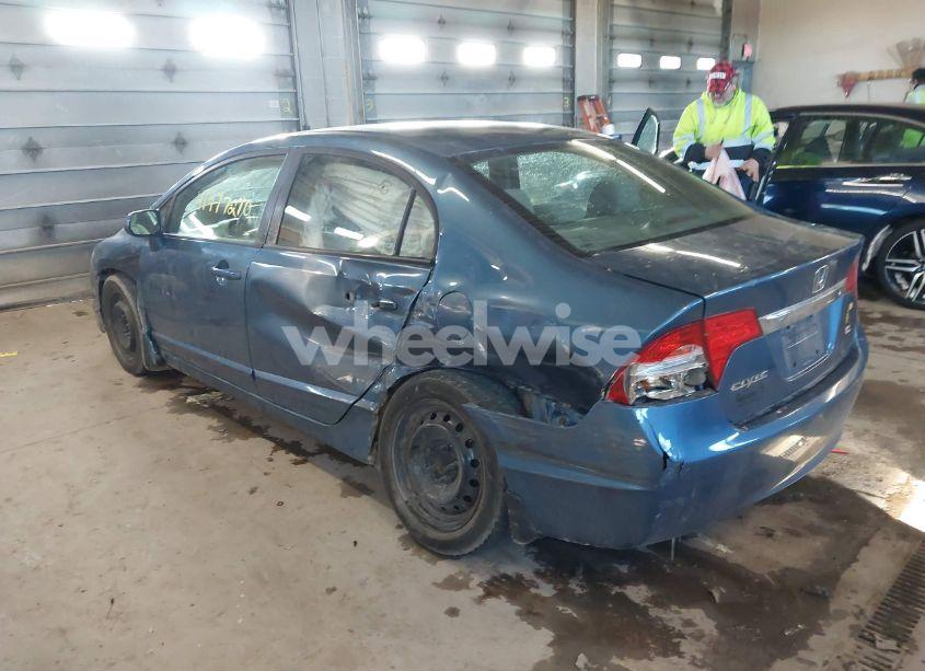 Photo 3 of 2011 Honda Civic LX (VIN 19XFA1F59BE018703)