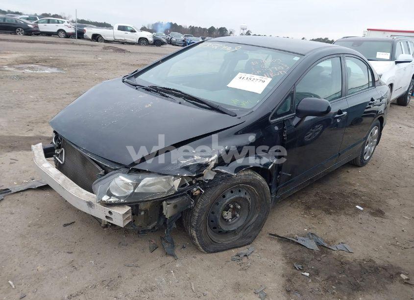 Photo 2 of 2011 Honda Civic LX (VIN 19XFA1F59BE034903)