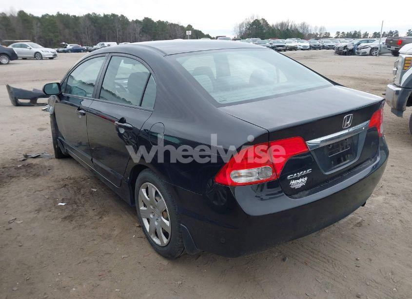 Photo 3 of 2011 Honda Civic LX (VIN 19XFA1F59BE034903)