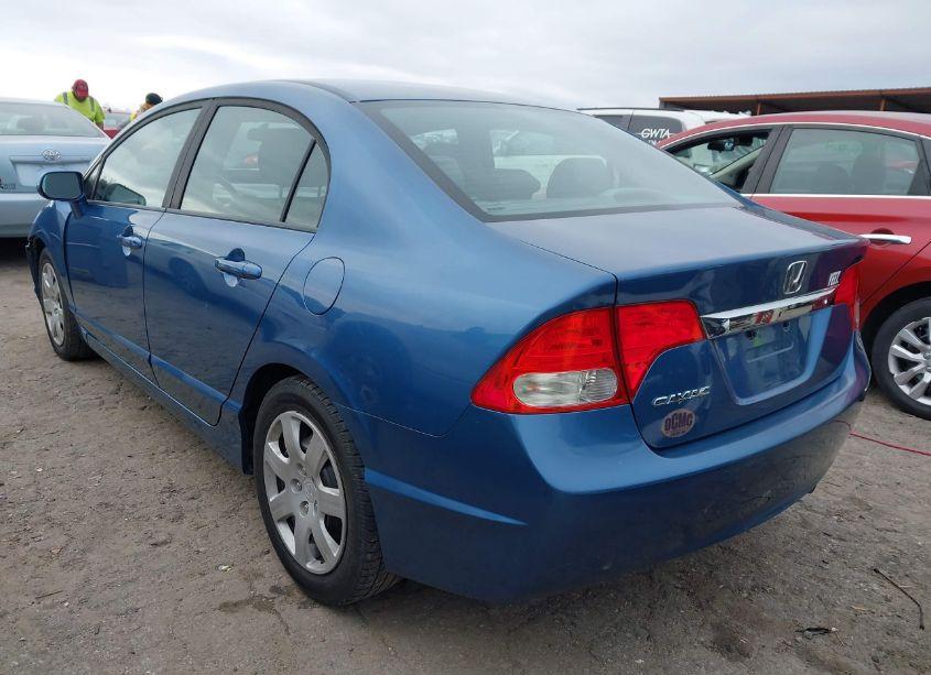 Photo 3 of 2011 Honda Civic LX (VIN 19XFA1F59BE035923)