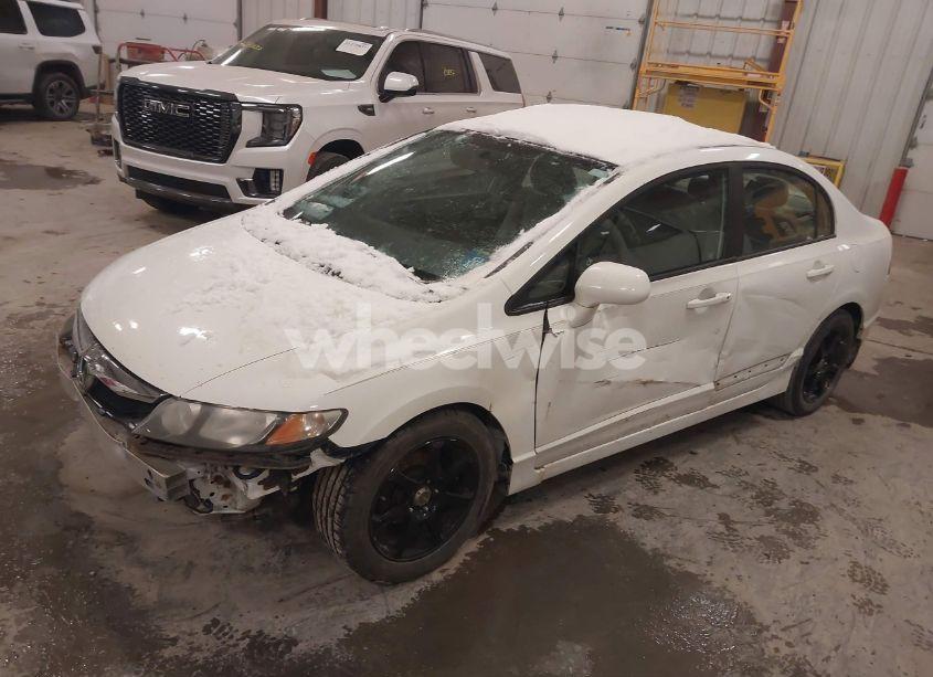 Photo 2 of 2011 Honda Civic LX (VIN 19XFA1F59BE048350)