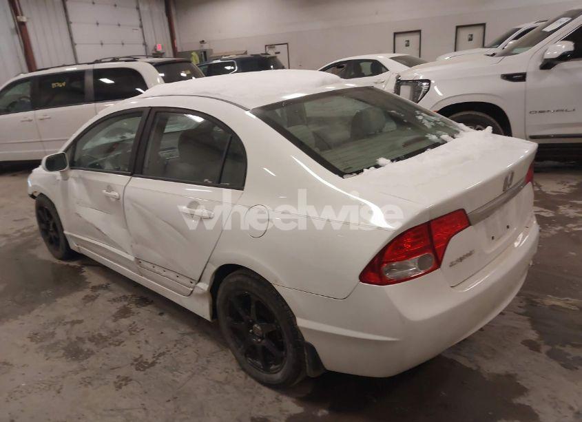 Photo 3 of 2011 Honda Civic LX (VIN 19XFA1F59BE048350)