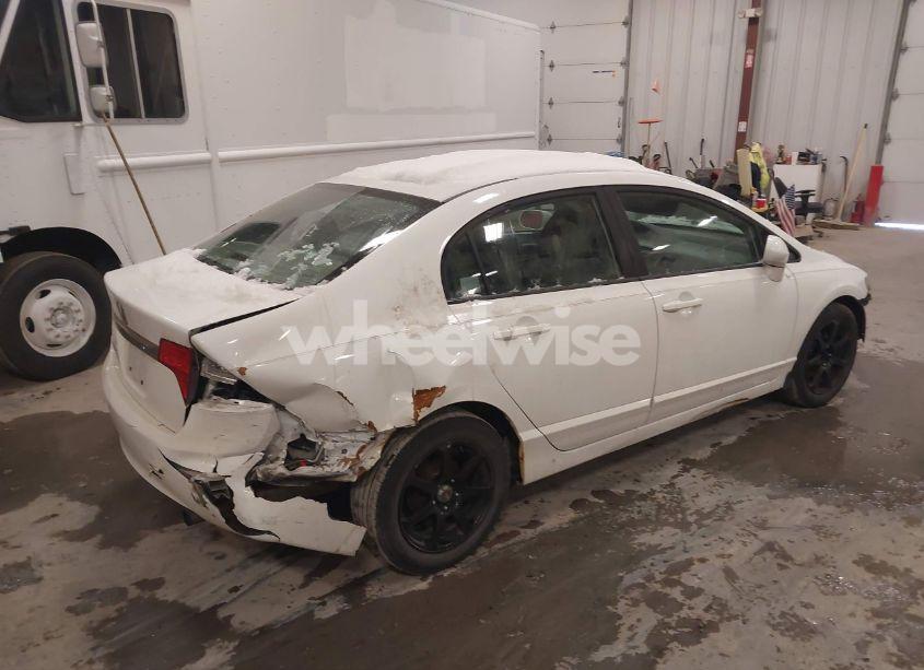 Photo 4 of 2011 Honda Civic LX (VIN 19XFA1F59BE048350)