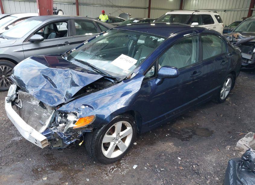 Photo 2 of 2011 Honda Civic LX (VIN 19XFA1F5XBE001344)