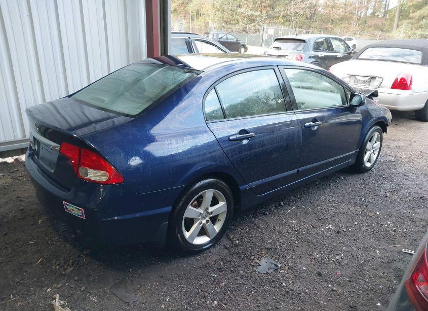 Photo 4 of 2011 Honda Civic LX (VIN 19XFA1F5XBE001344)