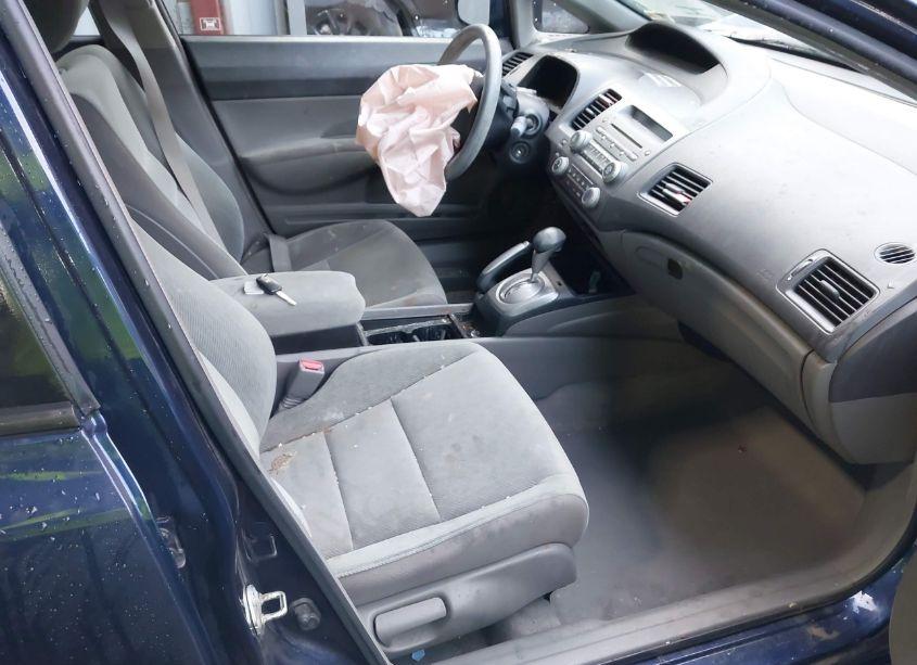 Photo 5 of 2011 Honda Civic LX (VIN 19XFA1F5XBE001344)