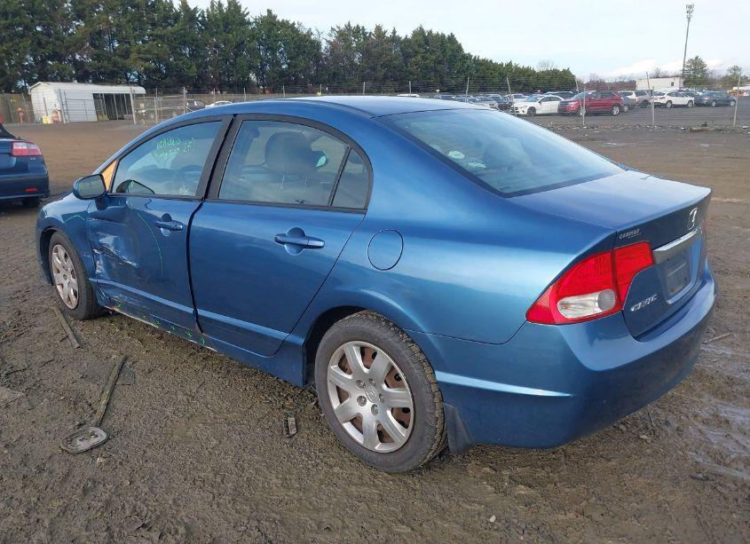 Photo 3 of 2011 Honda Civic LX (VIN 19XFA1F5XBE013140)