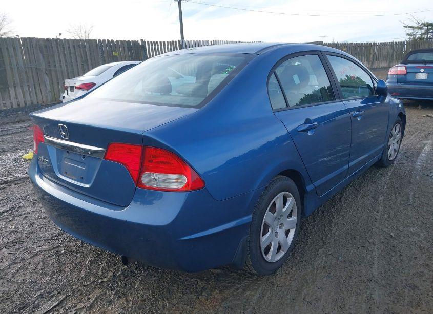 Photo 4 of 2011 Honda Civic LX (VIN 19XFA1F5XBE013140)