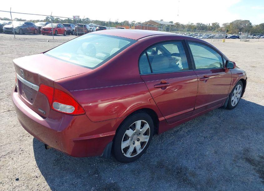 Photo 4 of 2011 Honda Civic LX (VIN 19XFA1F5XBE016152)