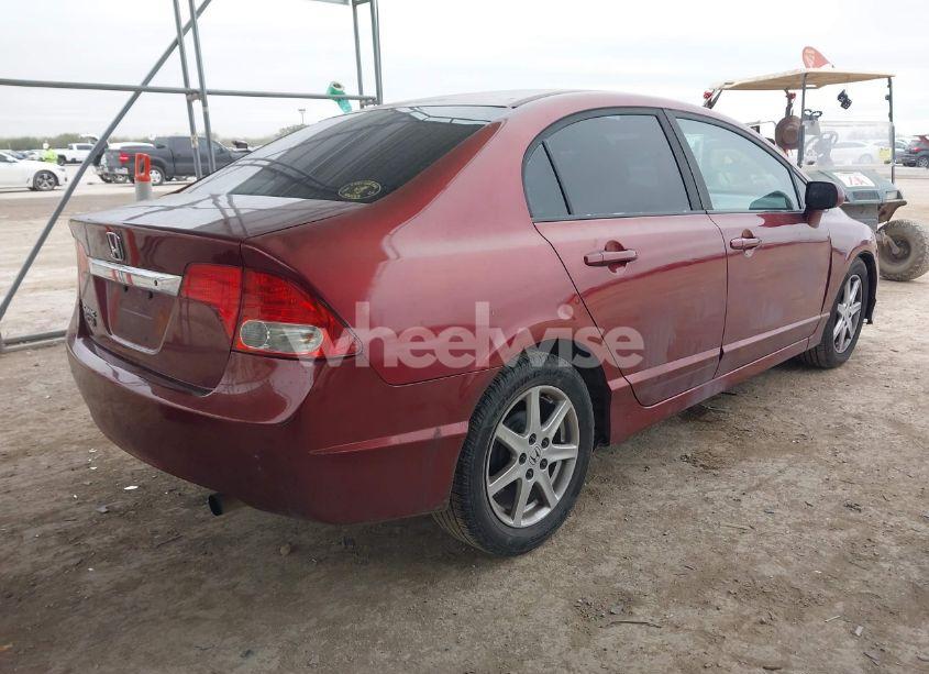 Photo 4 of 2011 Honda Civic LX (VIN 19XFA1F5XBE016166)