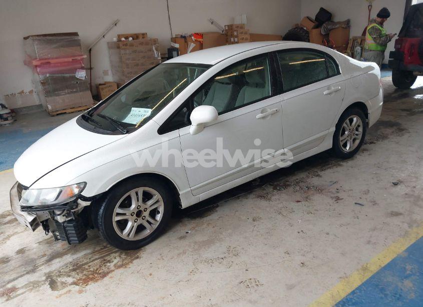 Photo 2 of 2011 Honda Civic LX (VIN 19XFA1F5XBE031881)