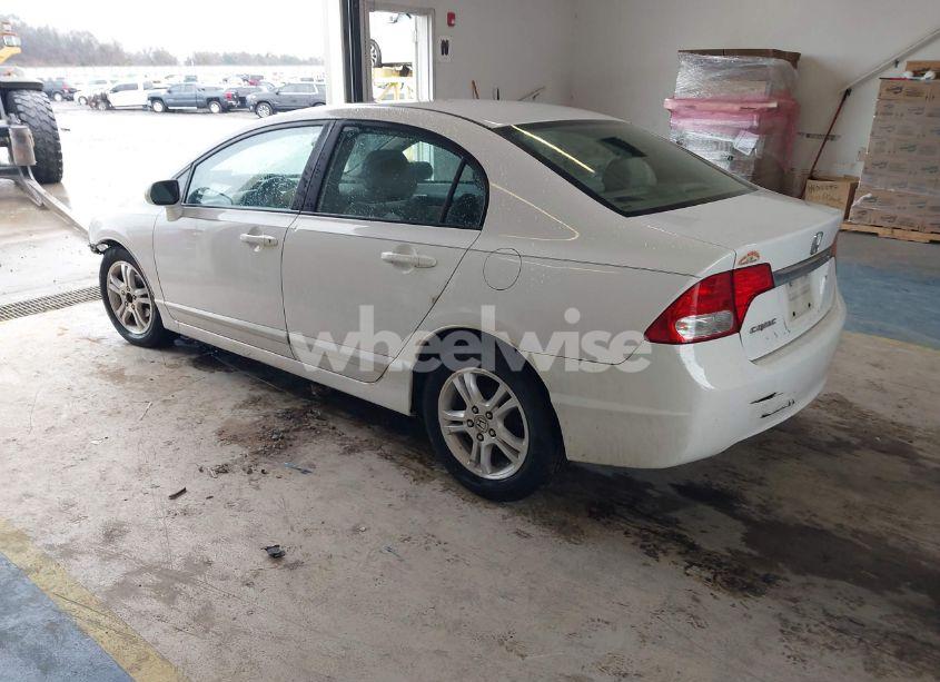 Photo 3 of 2011 Honda Civic LX (VIN 19XFA1F5XBE031881)