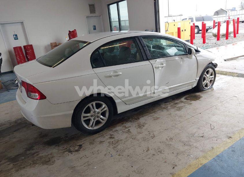 Photo 4 of 2011 Honda Civic LX (VIN 19XFA1F5XBE031881)