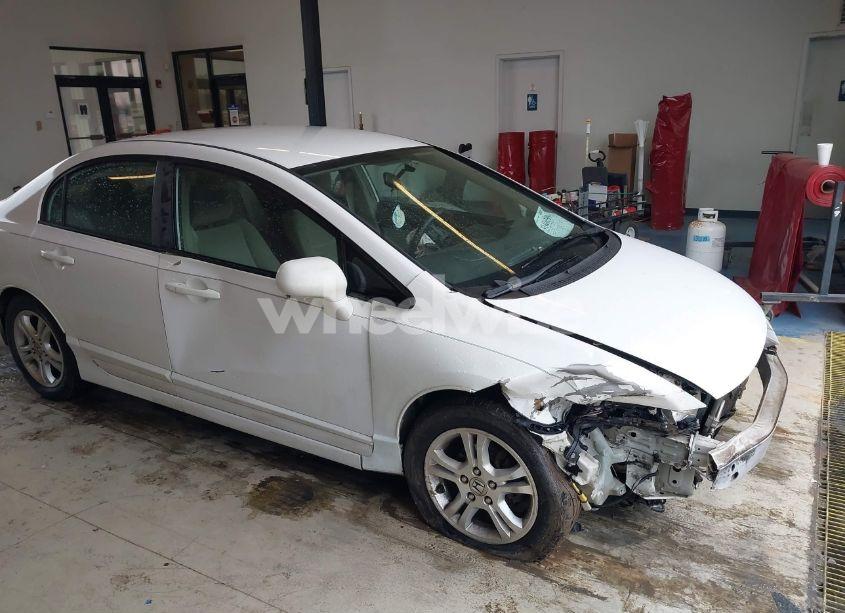 Photo 6 of 2011 Honda Civic LX (VIN 19XFA1F5XBE031881)