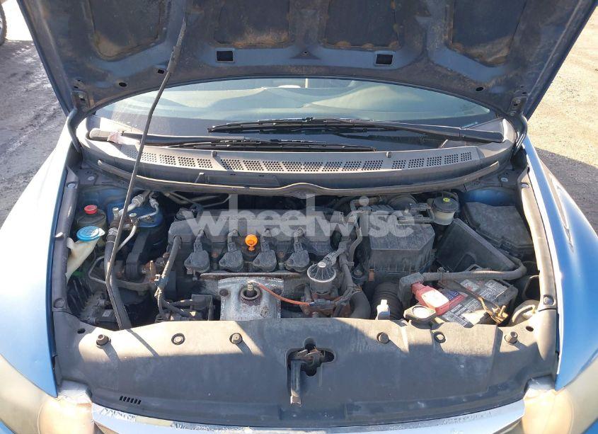 Photo 10 of 2011 Honda Civic LX (VIN 19XFA1F5XBE032402)
