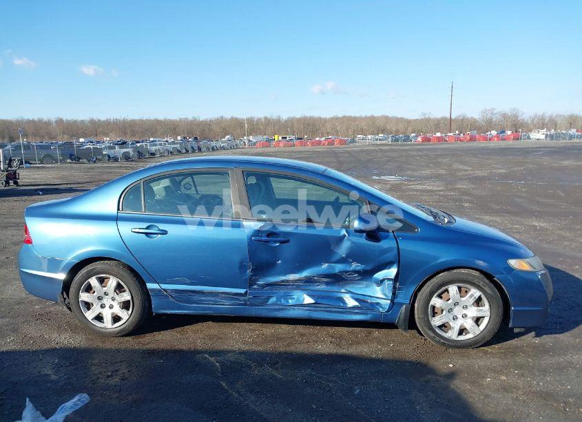 Photo 13 of 2011 Honda Civic LX (VIN 19XFA1F5XBE032402)