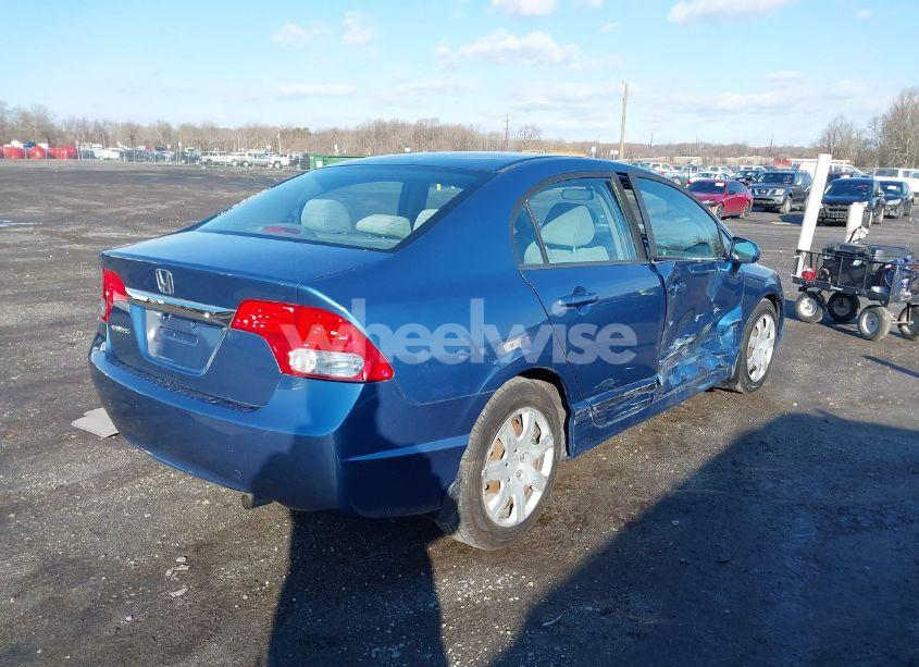 Photo 4 of 2011 Honda Civic LX (VIN 19XFA1F5XBE032402)