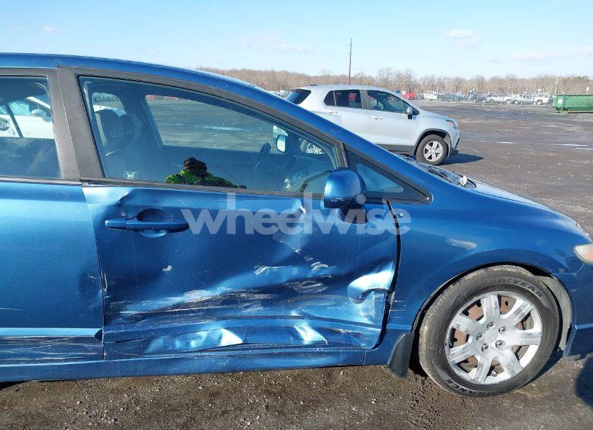 Photo 6 of 2011 Honda Civic LX (VIN 19XFA1F5XBE032402)