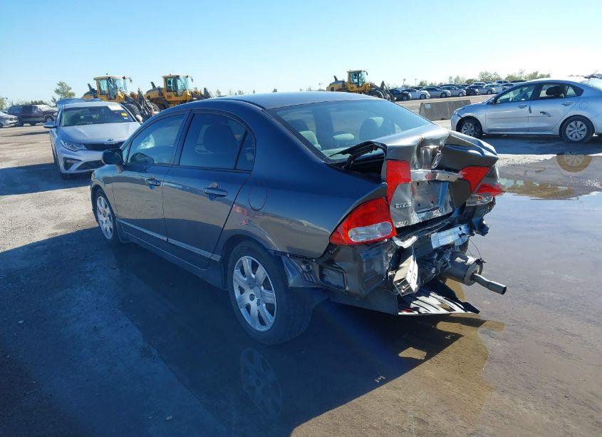 Photo 3 of 2011 Honda Civic LX (VIN 19XFA1F5XBE034876)