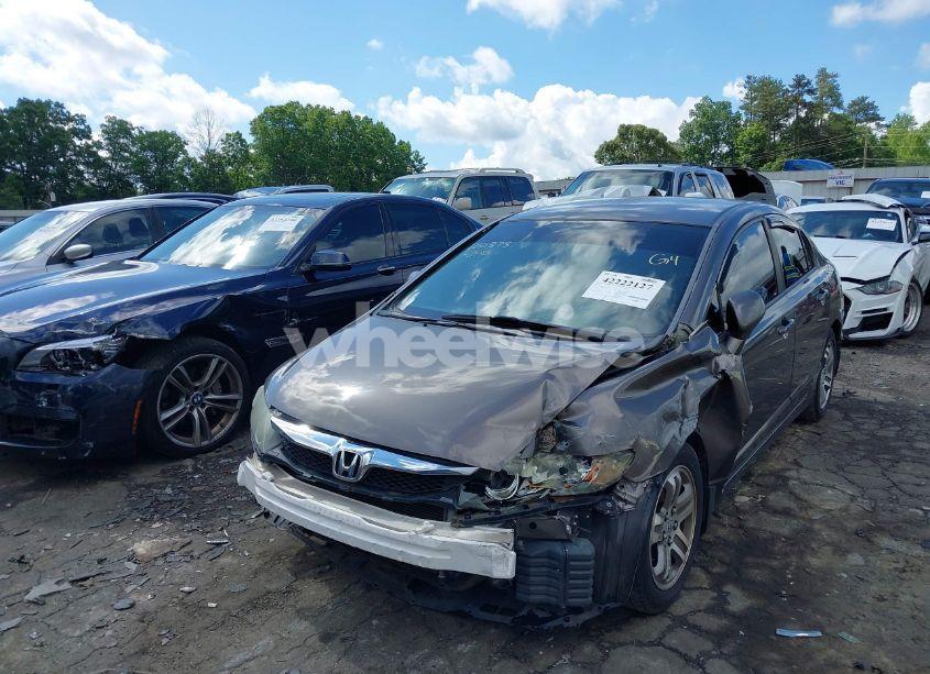 Photo 2 of 2011 Honda Civic LX (VIN 19XFA1F5XBE035459)