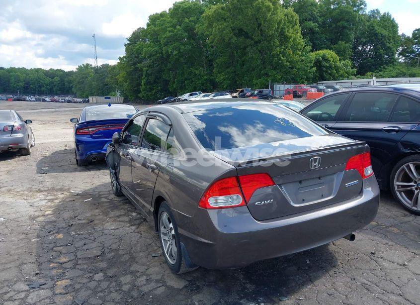 Photo 3 of 2011 Honda Civic LX (VIN 19XFA1F5XBE035459)