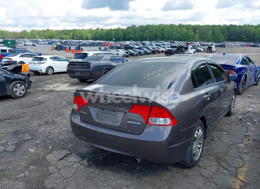 Photo 4 of 2011 Honda Civic LX (VIN 19XFA1F5XBE035459)