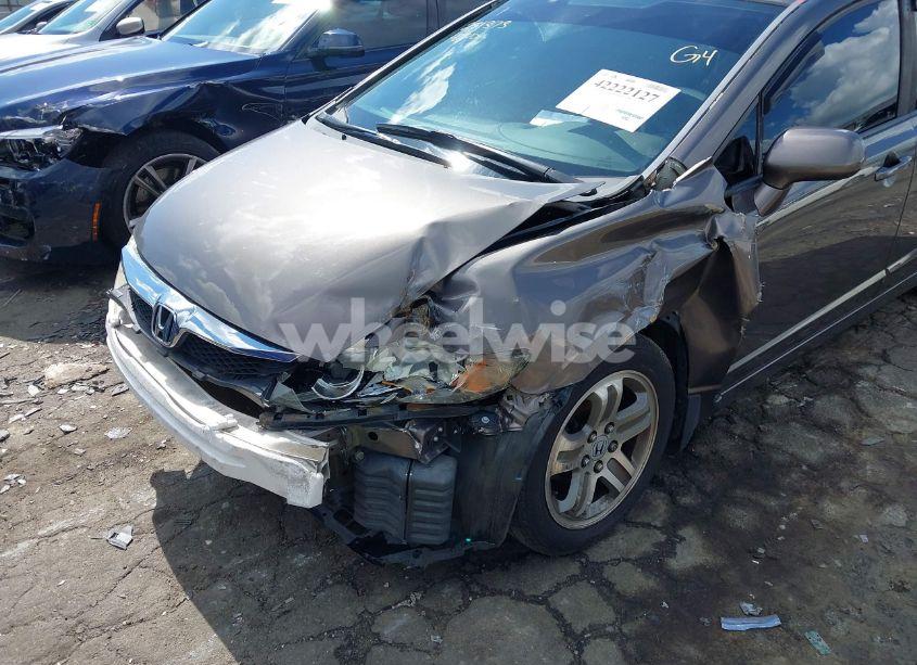 Photo 6 of 2011 Honda Civic LX (VIN 19XFA1F5XBE035459)