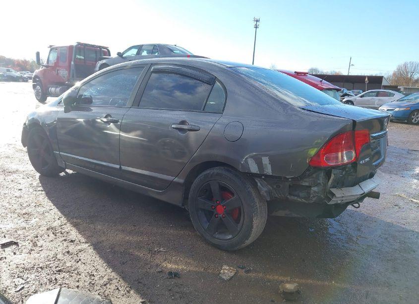 Photo 3 of 2011 Honda Civic LX (VIN 19XFA1F5XBE040273)