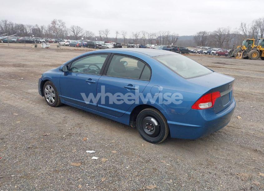 Photo 3 of 2011 Honda Civic LX (VIN 19XFA1F5XBE046901)