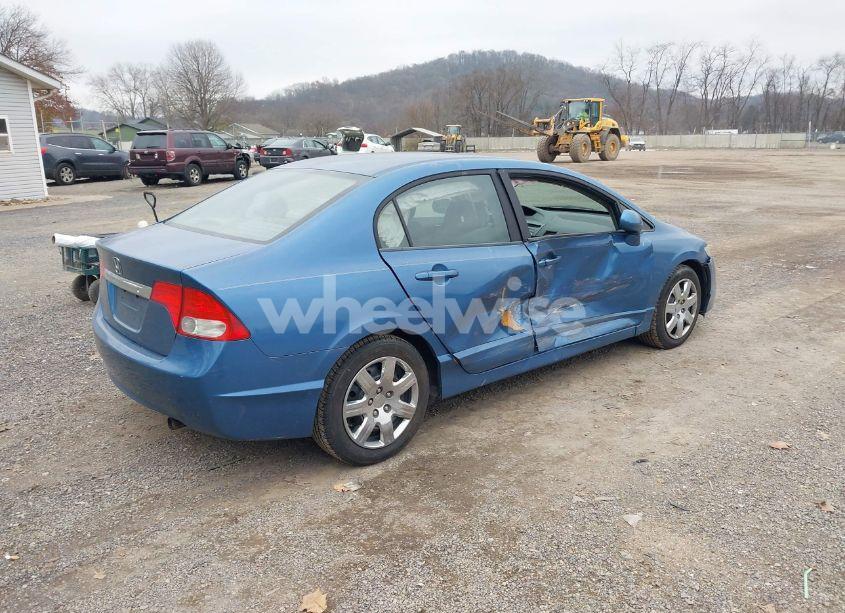 Photo 4 of 2011 Honda Civic LX (VIN 19XFA1F5XBE046901)