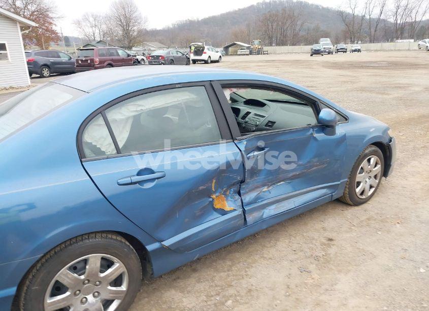 Photo 6 of 2011 Honda Civic LX (VIN 19XFA1F5XBE046901)