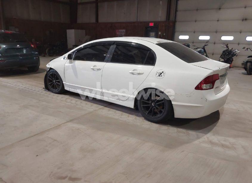 Photo 3 of 2010 Honda Civic EX (VIN 19XFA1F81AE047511)